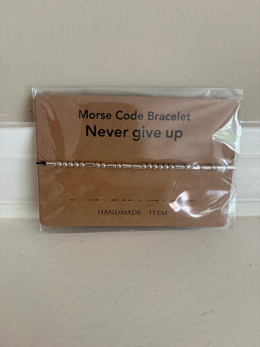 NWT never give up Morse code adjustable bracelet